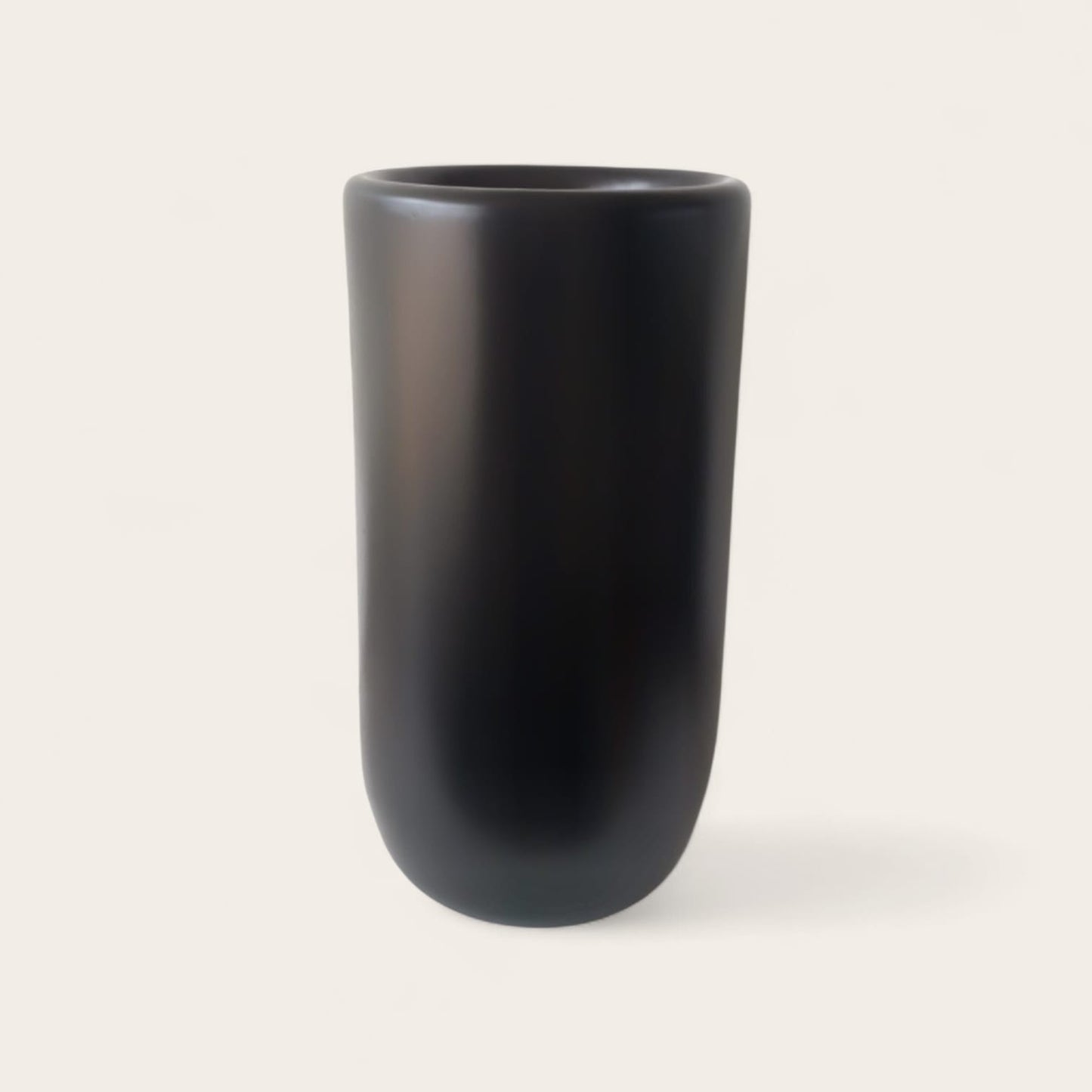 Black fiberglass planter with smooth finish, tall 70cm planter with 40cm diameter suitable for indoor and outdoor plants
