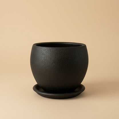 Black textured curvy clay plant pot with saucer, 25cm, also available in 30cm and 40cm