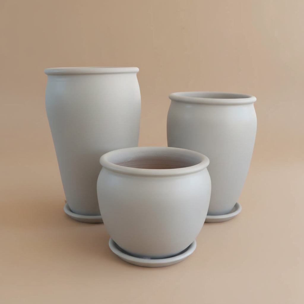 Grey vintage clay planter trio set with large planters
