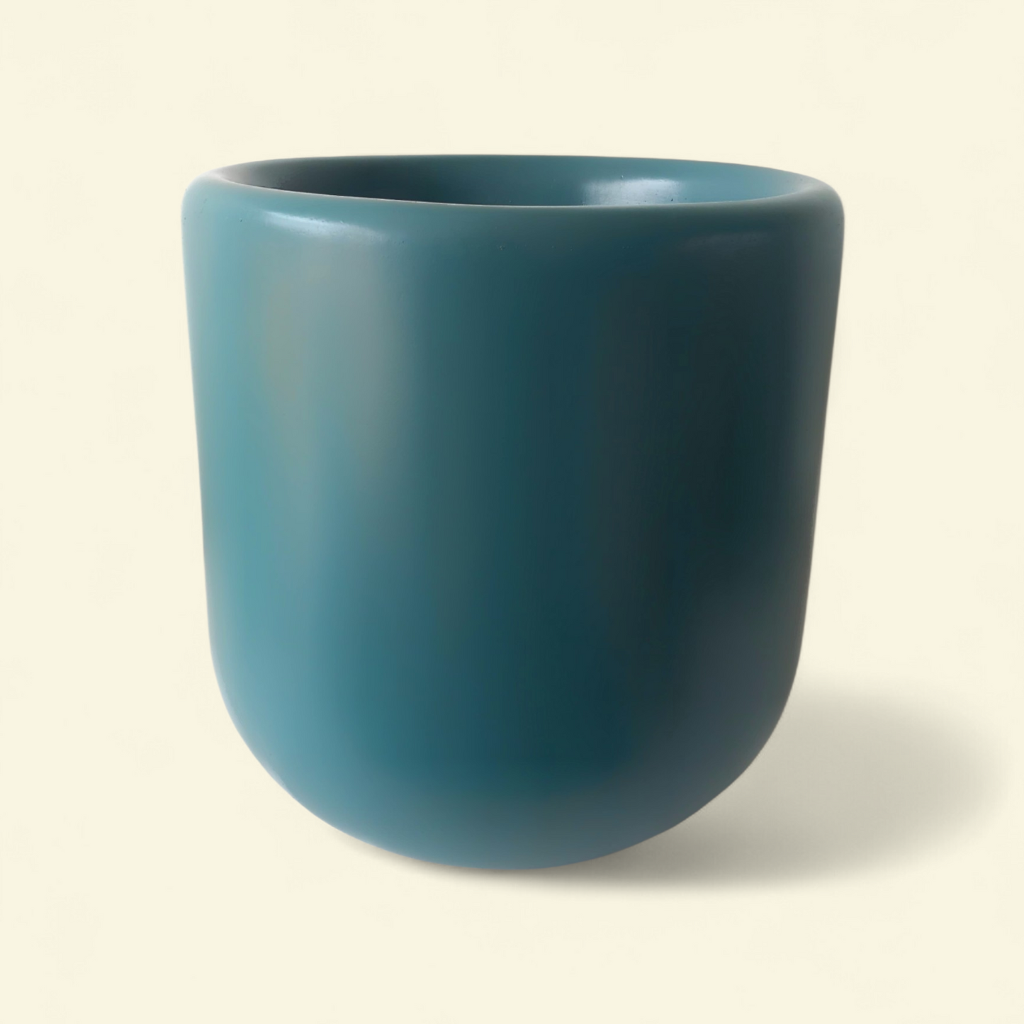 Teal fiberglass planter with smooth finish, available in 30cm, 40cm and 50cm sizes for indoor and outdoor plants
