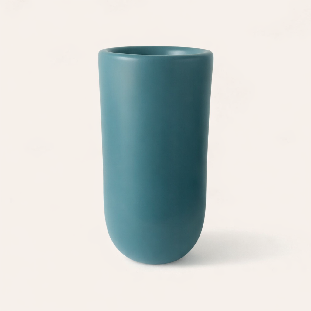 Teal fiberglass planter with smooth finish, tall 70cm planter with 40cm diameter suitable for indoor and outdoor plants

